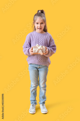 Cute little girl in knitted...