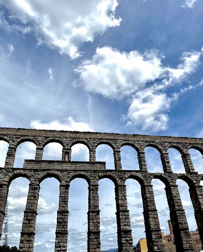 Roman aqueduct in a medieval town. Roman aqueduct in a medieval town.