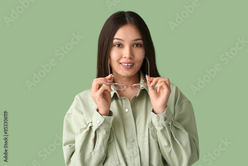 Beautiful young happy Asian...