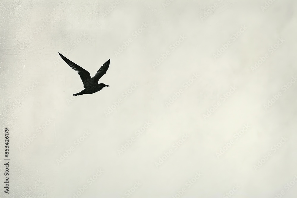 Fototapeta premium a minimalist art piece of a single migratory bird in flight