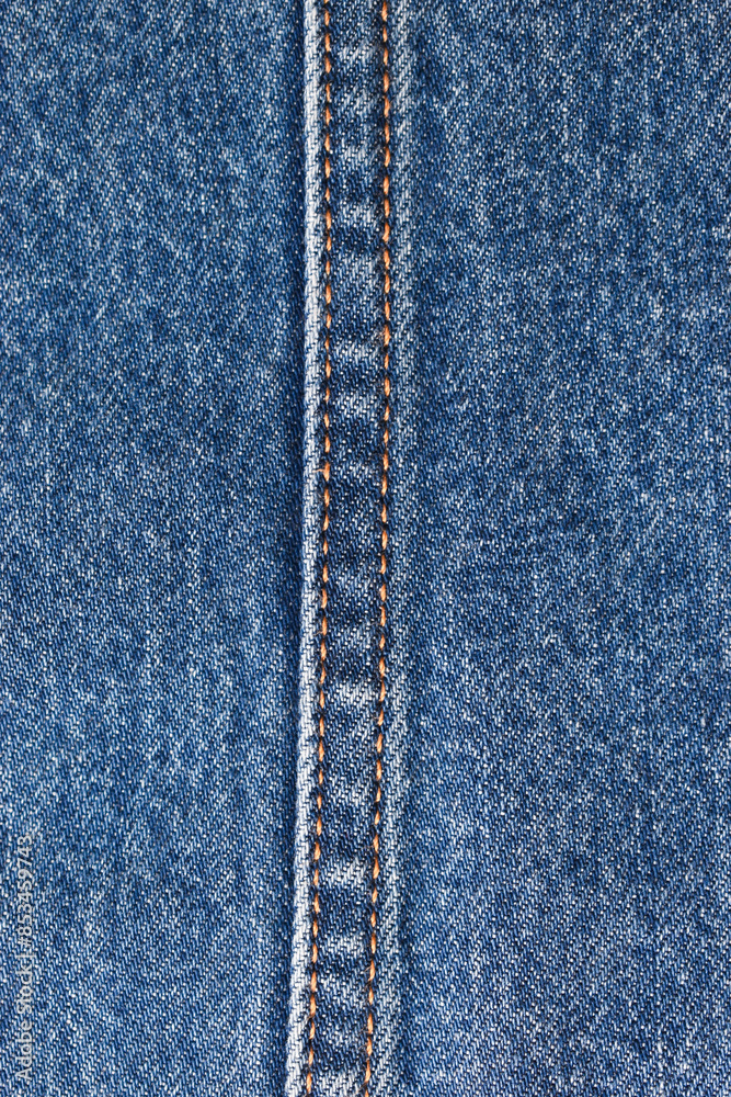 seam of blue denim texture background, jean fashion style seam of blue denim texture background, jean fashion style