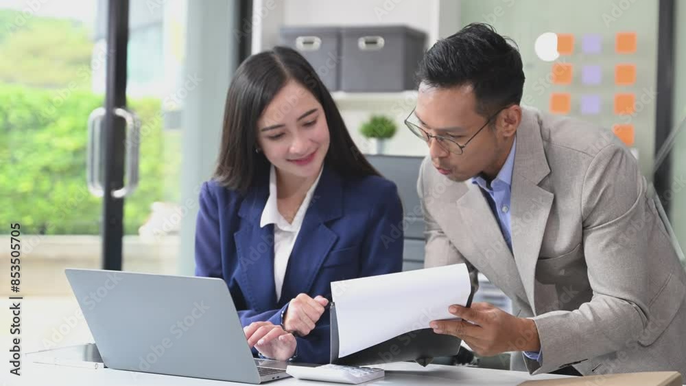 Kind leader executive manager share and discuss business solutions plan ideas on tablet with Asian female marketing manager Kind leader executive manager share and discuss business solutions plan ideas on tablet with Asian female marketing manager