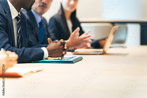 Group of multinational business people meeting in a conference room