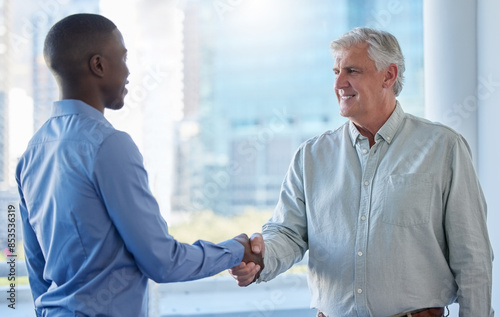 Handshake, meeting and business men in office for partnership, collaboration and onboarding. Corporate, teamwork and manager with man shaking hands for agreement, recruitment and interview success