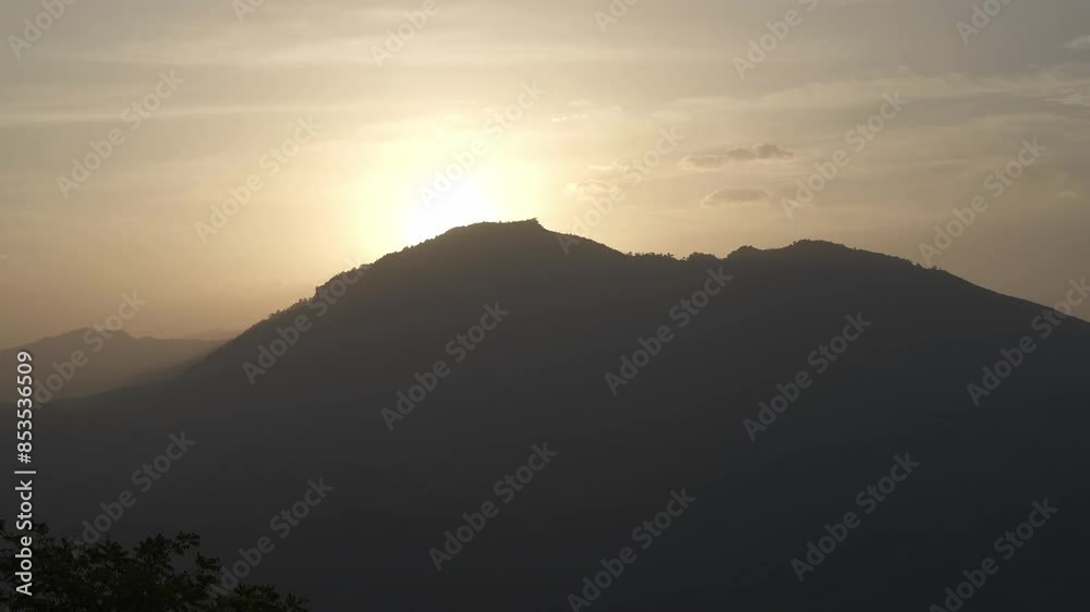 The sun is rising over the mountain. The sun is rising over the mountain.