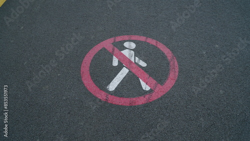 Bicycle sign on the road. Bike lane in the park.