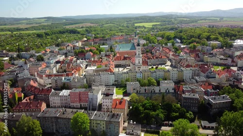 The verdant countryside and rolling hills frame the picturesque town. Prudnik, Poland - Prudnik, Polska photo