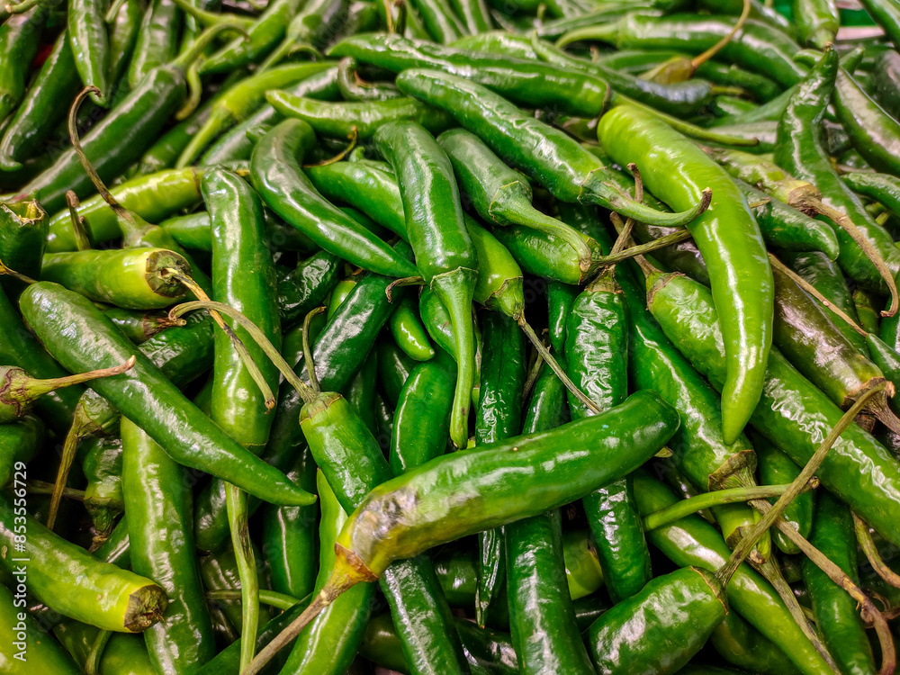 Fresh Green Chili Peppers at a Local Market Fresh Green Chili Peppers at a Local Market