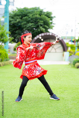 小学生の女の子がよさこいを踊るポートレート photo