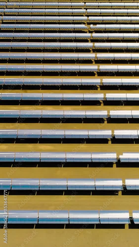 Concave mirrors in rows in Thermosolar power plant vertical video. Concave mirrors in rows in Thermosolar power plant vertical video.