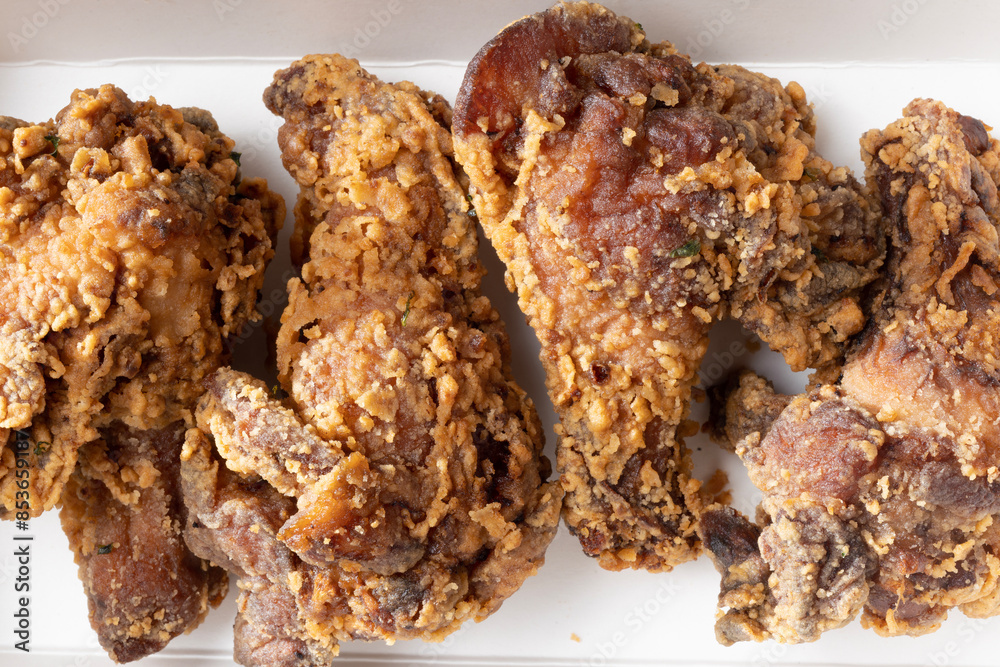 street food truck fried chicken wing drumlets in batter