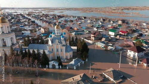 The flooded city. Damaged houses in the flood. The houses were washed away by the current of the water. A city destroyed by a flood. A natural disaster, an emergency. An environmental disaster. Damage