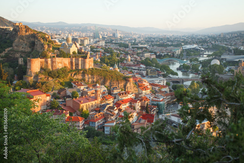 Landscape of old Tbilisi and Metekhi Church photo