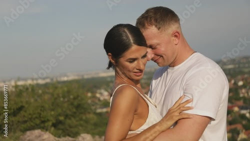 Couple in love face to face, tender hugging 