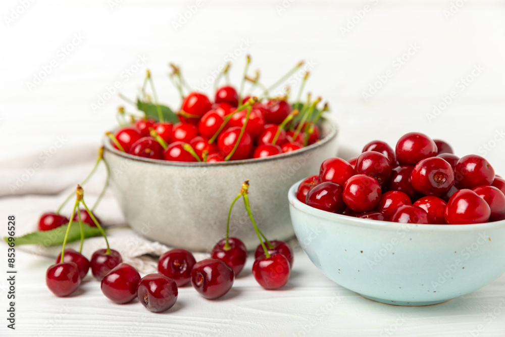 Cherries. Fresh ripe cherries with leaves on a textured wooden background. Fresh sweet organic cherry pile. Berries and fruits. Vegan. Healthy eating. Place for text. Copy space Cherries. Fresh ripe cherries with leaves on a textured wooden background. Fresh sweet organic cherry pile. Berries and fruits. Vegan. Healthy eating. Place for text. Copy space