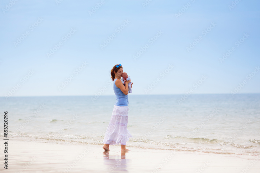 Mother and child on beach. Vacation with baby. Mother and child on beach. Vacation with baby.