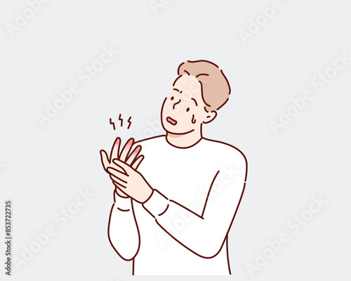 Bruised finger, burn. Sad man looks at reddened, broken finger. Damage to hand.Hand drawn style vector design illustrations.