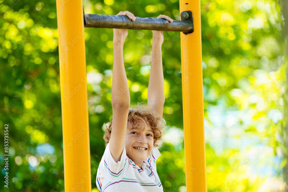 Fototapeta premium Child on playground. Active kid in school yard.