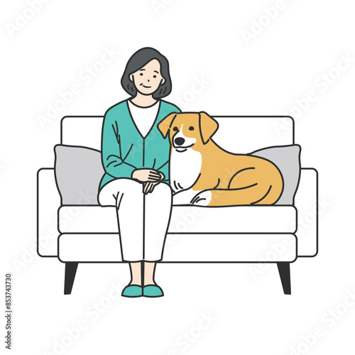 ソファに座るシニア女性とペットの犬
