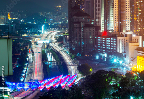 Photography Downtown Kuala Lumpur city and Saloma Link Bridge,lit up at night KL City,Malaysia