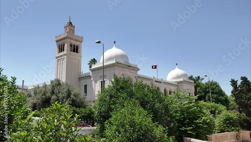 Tunis, Tunisia - 05-29-2024 -  Kasbah square the town hall (Hotel de Ville) Tunis, and the National Monument in the center