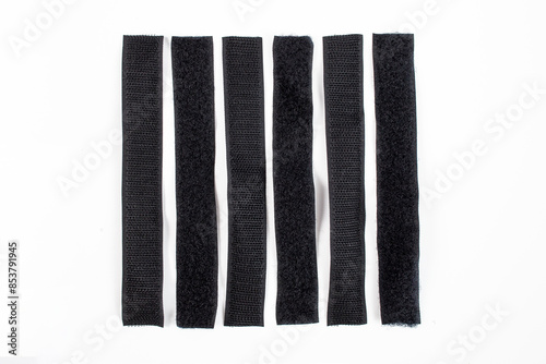 Bild auf Leinwand Velcro sticky tape strips pairs isolated on white background, flat lay close up