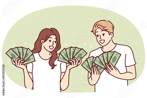 Man and woman with lot of cash in hands brag about money they earned from business or winning jackpot in lottery. Couple rich guys girls with money want to invest savings or invest in startup