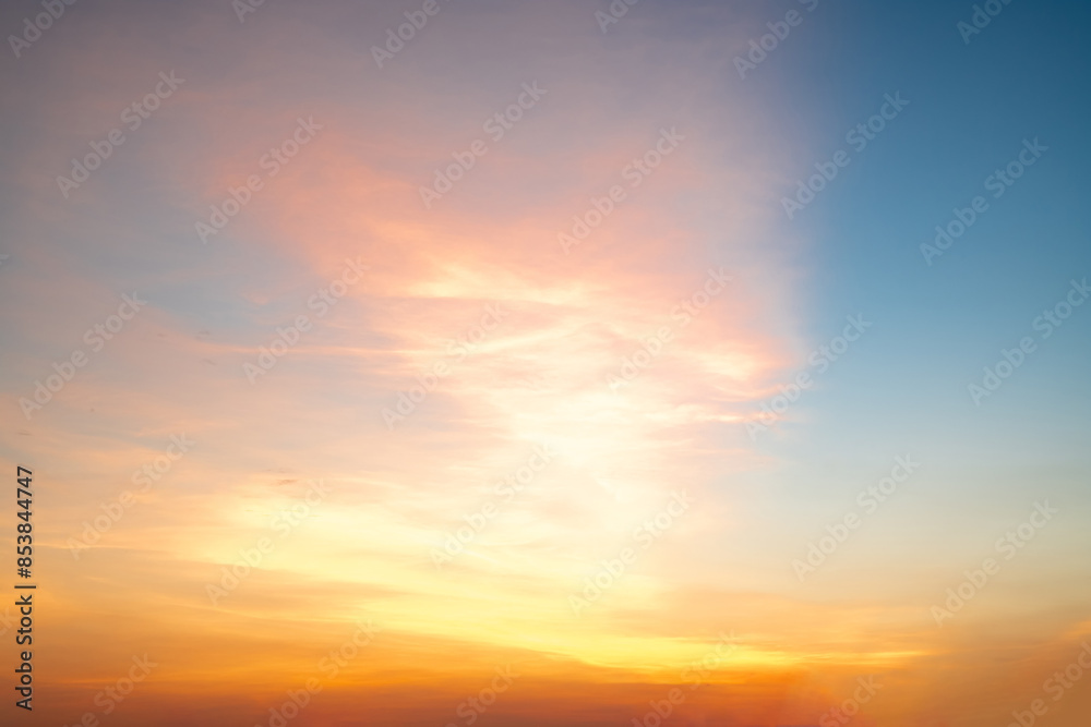 Beautiful , luxury soft gradient orange gold clouds and sunlight on the blue sky perfect for the background, take in everning,Twilight, Large size, high definition landscape photo Beautiful , luxury soft gradient orange gold clouds and sunlight on the blue sky perfect for the background, take in everning,Twilight, Large size, high definition landscape photo