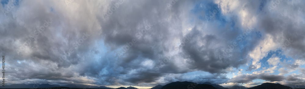 Aerial panorama Cloudscape of Canadian Mountain Landscape in Valley. BC, Canada. Sunset Aerial panorama Cloudscape of Canadian Mountain Landscape in Valley. BC, Canada. Sunset