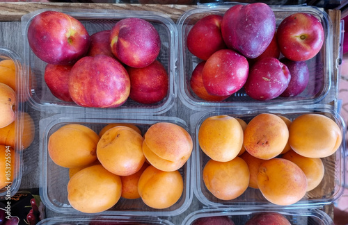 peach appricots fruits on a stall in summer season preveza city greece photo