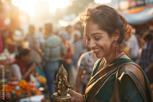  A young woman in Mumbai finds the perfect Ganesh murti, anticipation for the festival sparkling in her eyes. photo
