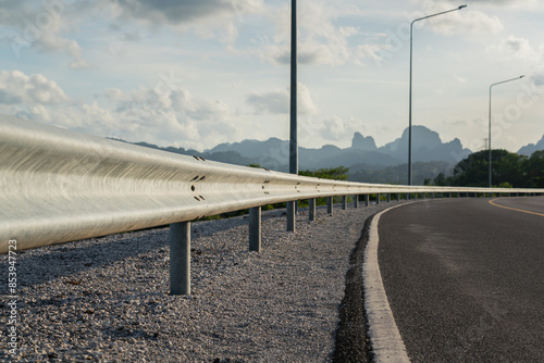 Картината върху платно Roadside metal rail barrier structure which is installed on side of the road for protected the car accident