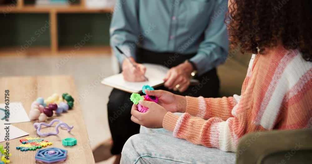Mental health, child and talking with therapist, hands and toys for problem solving of kid. Office, service and doctor with closeup, listening and understanding of youth, psychology and notes