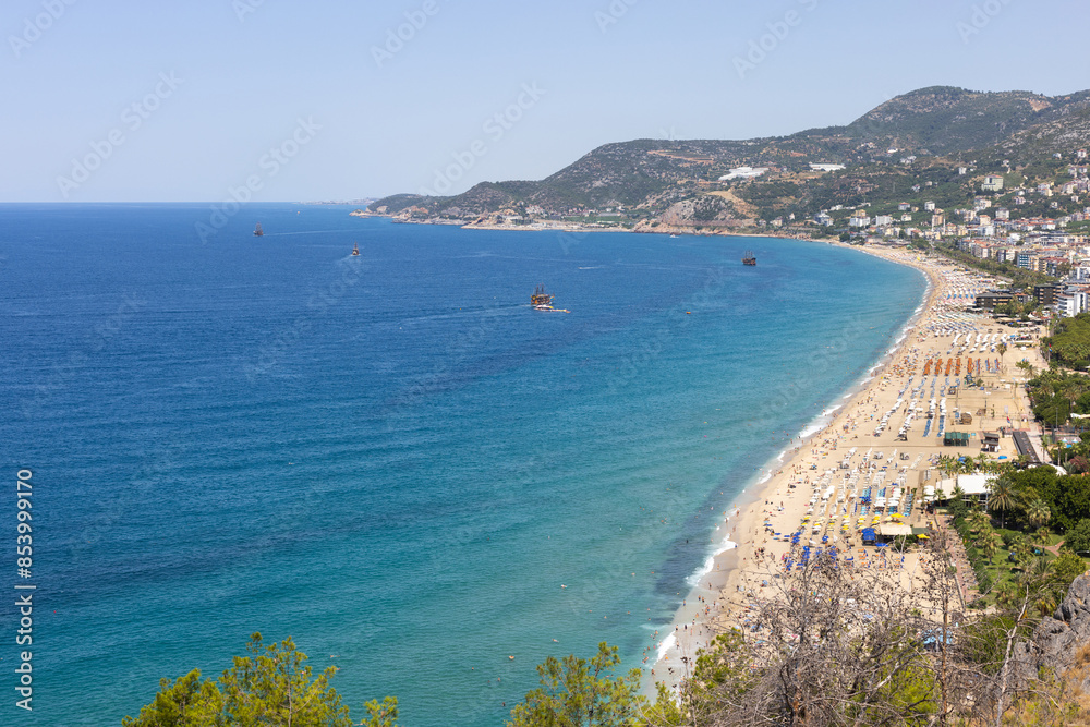 coast of Alanya in summer, crowded beach hotels near Mediterranean sea in Turkey, aerial view coast of Alanya in summer, crowded beach hotels near Mediterranean sea in Turkey, aerial view