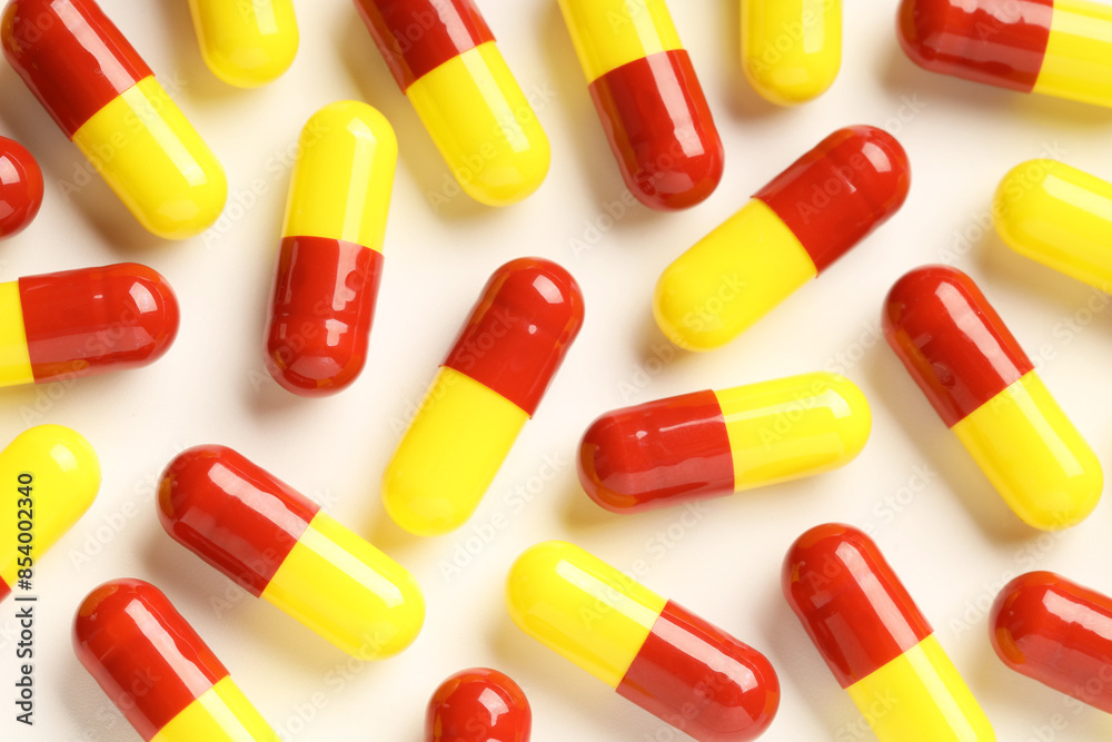 Many antibiotic pills on white background, top view Many antibiotic pills on white background, top view