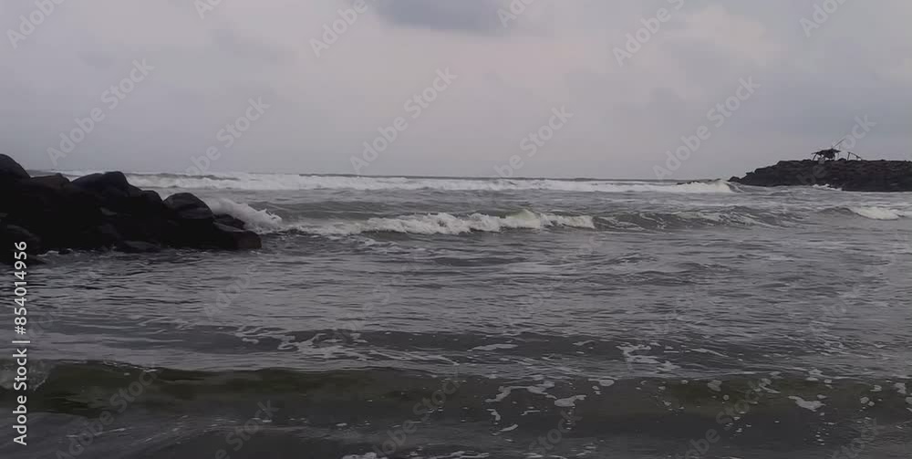 waves crashing on a beautiful beach in the afternoon waves crashing on a beautiful beach in the afternoon