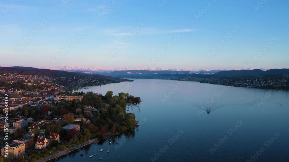 Zurich Lake and Swiss Alps on Sunny Day. Snow-Capped Mountains. Switzerland. Aerial View. Drone Moves Forward