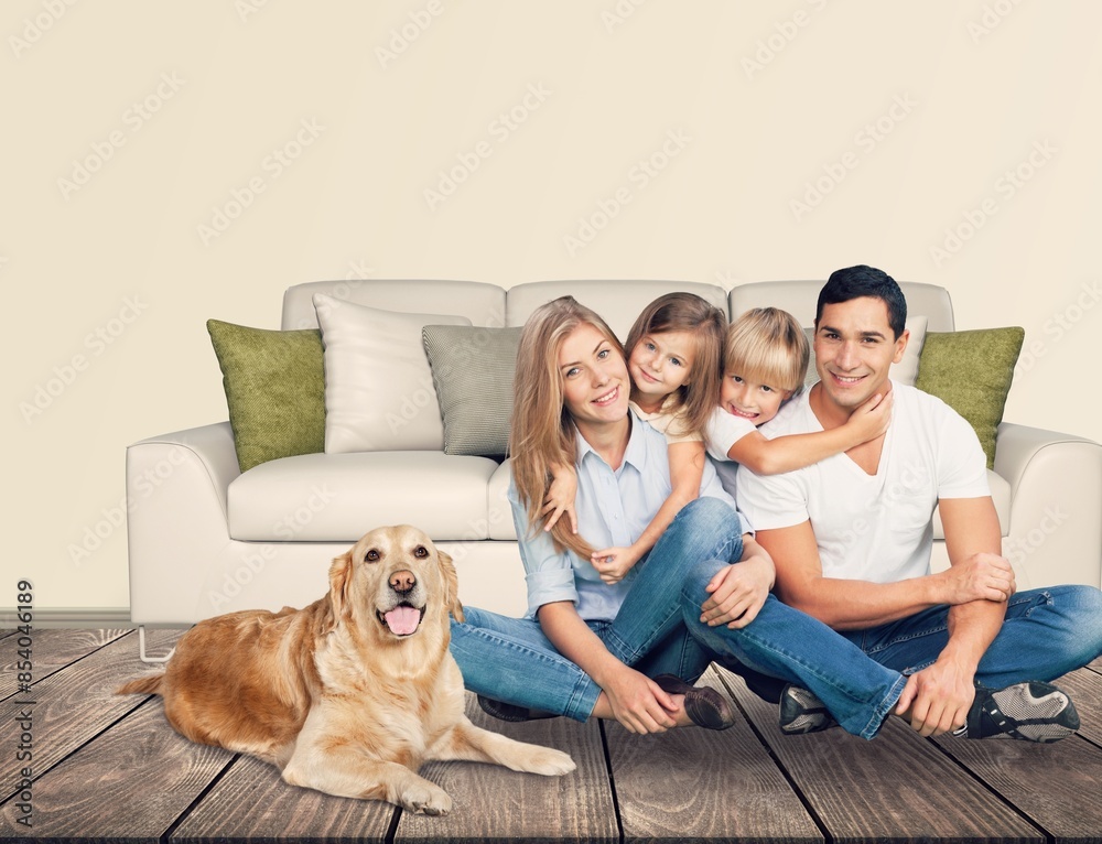 Smiling beautiful happy family with children and dog relaxing together Smiling beautiful happy family with children and dog relaxing together