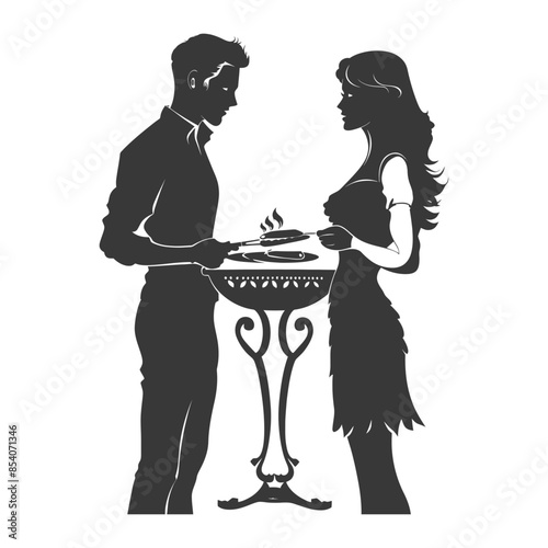Silhouette Romance: Couple Grilling on Ornate Charcoal Grill