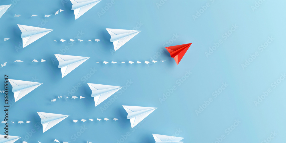 Red paper plane leading white paper planes Red paper plane leading white paper planes
