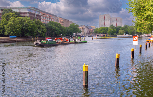 Embankment of the Spree River in the historical part of Berlin on a sunny day. Germany.