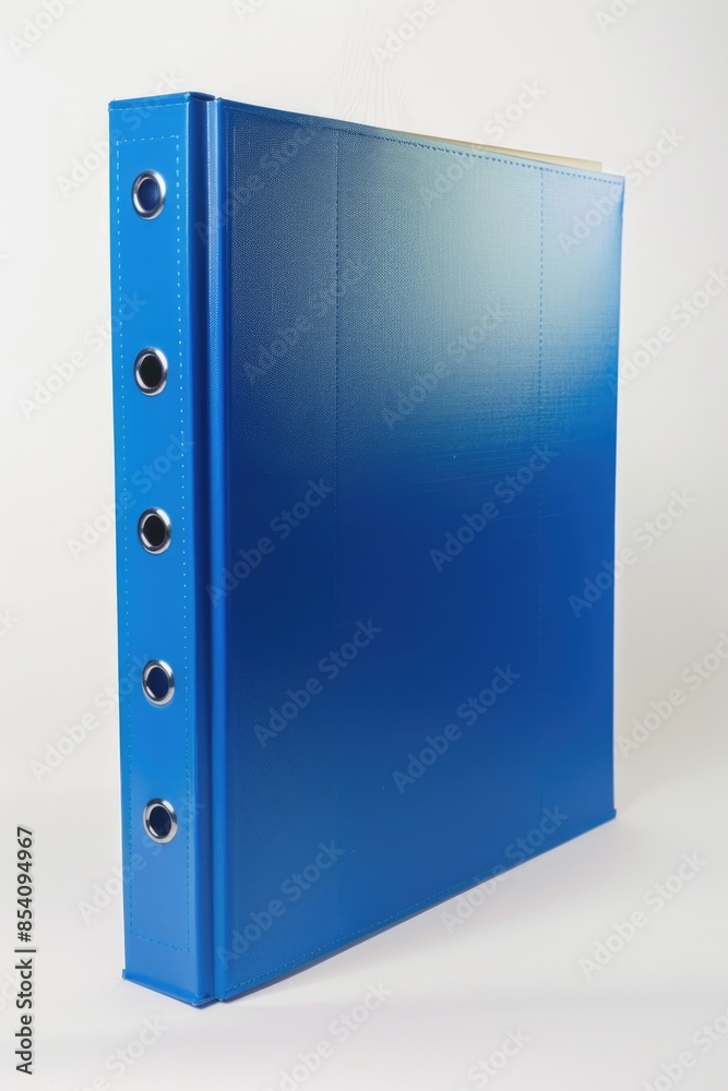 A blue binder sitting on a white table
