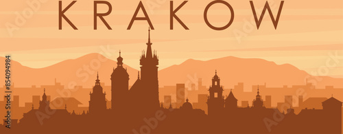 Brown panoramic poster of the city skyline with misty background buildings, sunrise, clouds and mountains of KRAKOW, POLAND