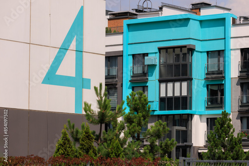 Digits of house numbers on modern buildings in the city