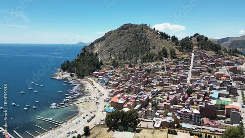 Aerial video over the town of Copacabana on the shoreline of Lake Titicaca, Bolivia