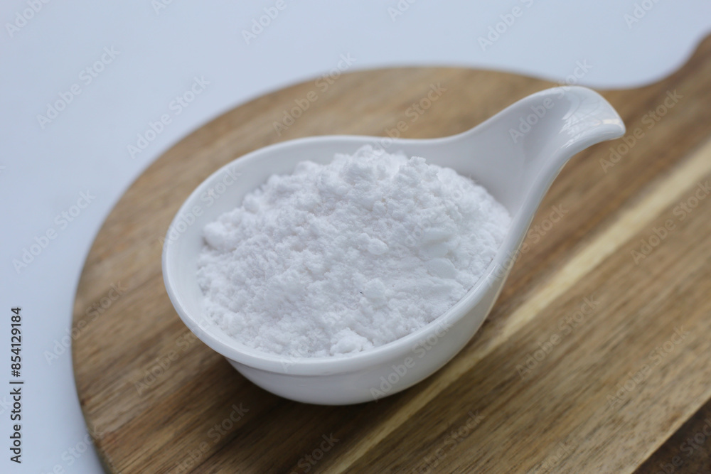 Bowl of baking soda, Sodium bicarbonate powder Bowl of baking soda, Sodium bicarbonate powder