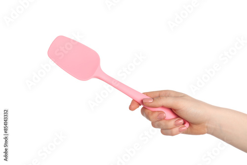 Woman with pink spatula on white background, closeup photo