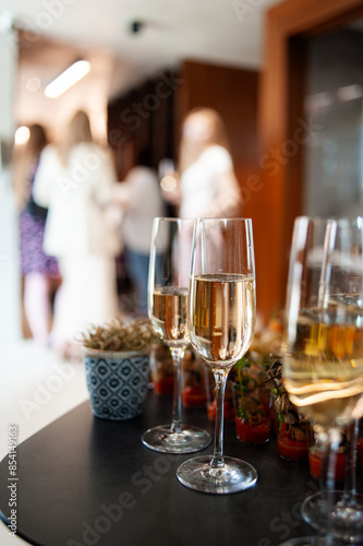 Wine tasting. Sommelier pours wine into a glass © alipko