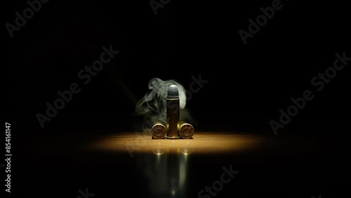 Bullet in dark with smoke