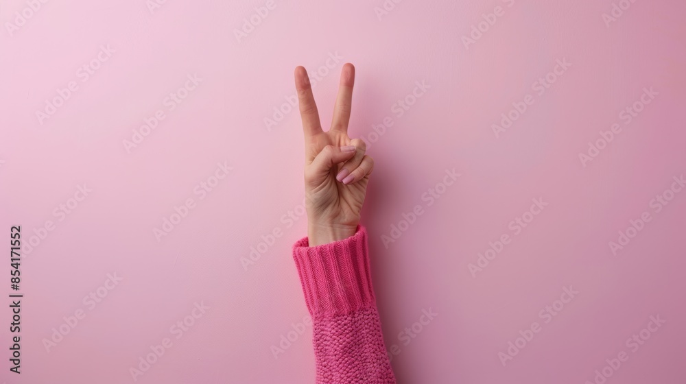 Peaceful Gesture on Pink Background Generative AI Peaceful Gesture on Pink Background Generative AI